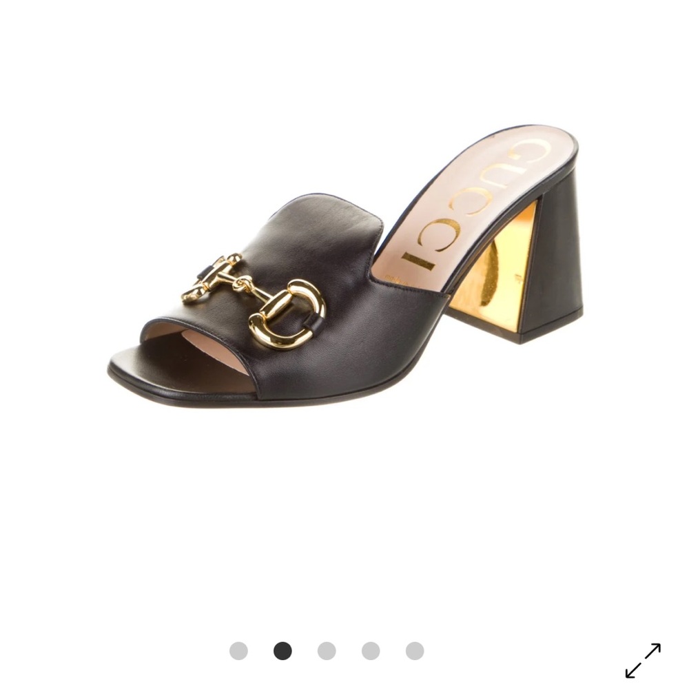Gucci Black Leather Mules with Gold Accent
